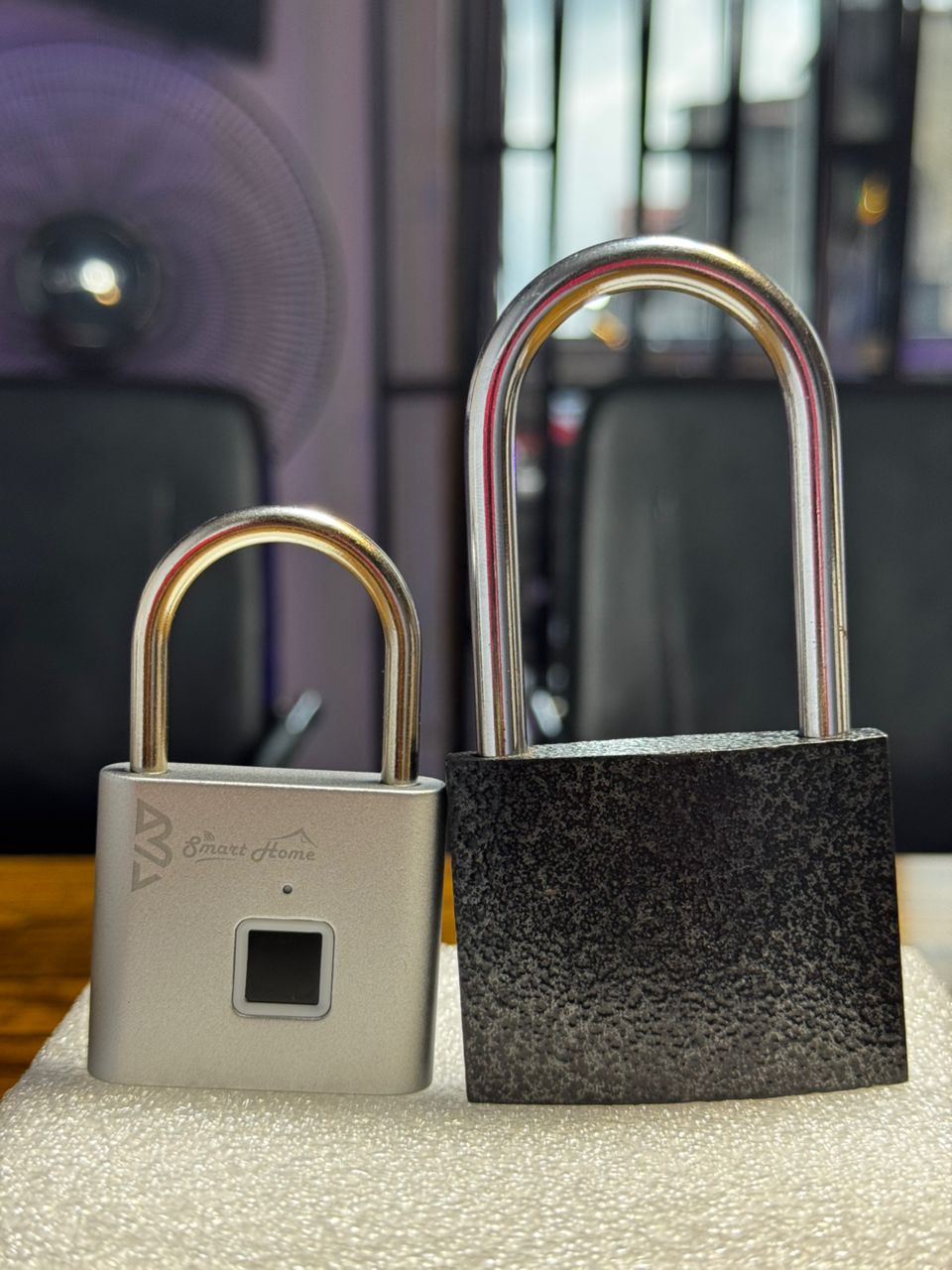 BSmart Home Smart Padlock in use on a bag demonstrating keyless access